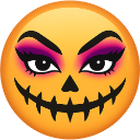 Pumpkin face with dark eyeshadow and a stitched mouth smiling mischievously.