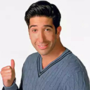 Ross Geller smiling with a smug expression while giving a thumbs up gesture.