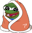 A green frog with a happy expression wrapped in an orange blanket.