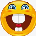 Yellow smiley face with wide blue eyes and large prominent buck teeth grinning broadly.