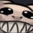 Face with large dark eyes and an extremely wide, toothy, unsettling grin.
