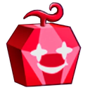 Ruby gemstone with a wide, star-eyed grin and a mischievous expression.