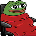 Pepe the Frog sitting in a chair wrapped in a red blanket with a content expression.