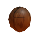 A brown coconut with a simple, etched face showing a confused expression.