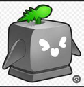 A gray cube-shaped creature with a green sprout on its head and white markings on its face.
