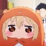 Umaru Doma wearing an orange hamster hoodie with a suspicious and judgmental facial expression.