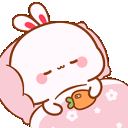 A cute white bunny with pink ears sleeping under a pink blanket while holding a small carrot.