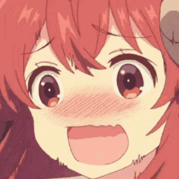 Shamiko from The Demon Girl Next Door with a wide, happy smile and a deep red blush across her face.
