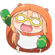 Umaru Doma in her orange hoodie shaking green maracas excitedly.