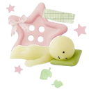 Smiski figure sleeping peacefully on a green pillow next to a pink star.