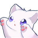 White kitten reaching forward with its front paws showing pink heart-shaped toe beans.